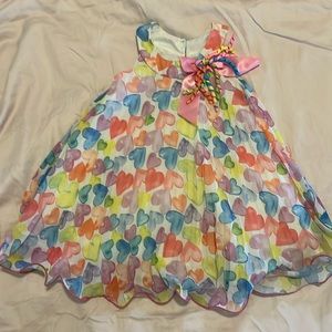 Absolutely adorable colorful dress. Size 2T.